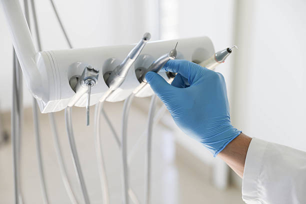 Professional Tooth Extraction technician working in Cibolo, TX